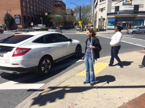 Photo of me standing at an urban crosswalk